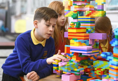 Children playing with Lego